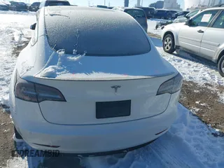 2021 Tesla Model 3 Performance with VIN 5YJ3E1EC1MF063445, listed as a IAAI auction lot 41293243 with 43,143 mi miles and . Bid and sale history available at DreamBid. Image 16.