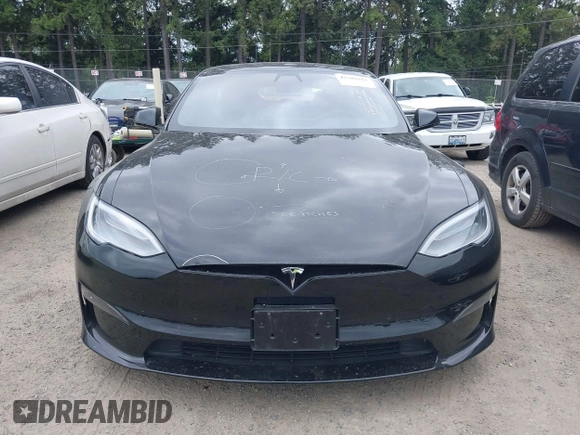 2021 Tesla Model S Plaid with VIN 5YJSA1E62MF447509, listed as a IAAI auction lot 42509281 with 32,372 mi miles and . Bid and sale history available at DreamBid. Image 13.