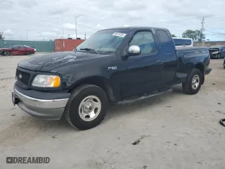 2002 Ford F-150 XL with VIN 2FTRX07222CA18022, listed as a Copart auction lot 80419784 with 283,975 mi miles and Salvage Title. Bid and sale history available at carsss.com. Image 1.