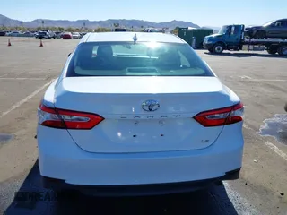 2019 Toyota Camry LE with VIN 4T1B11HK3KU772369, listed as a IAAI auction lot 41353103 with 85,565 mi miles and . Bid and sale history available at DreamBid. Image 15.