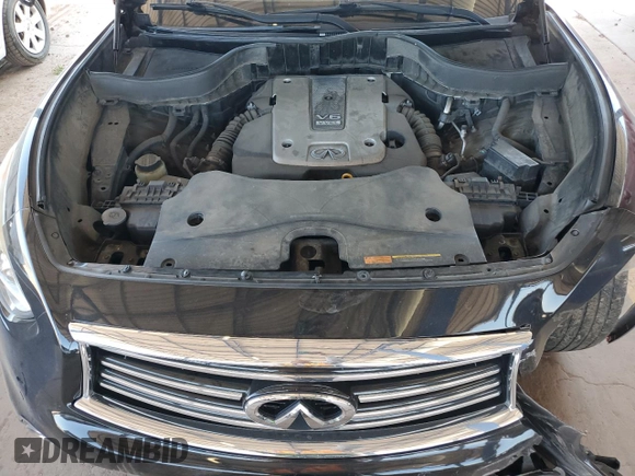 2015 Infiniti QX70 z VIN JN8CS1MW9FM481836, wystawiony jako Copart lot #57801425 z przebiegiem 130 011 mil mil oraz Szkoda całkowita • Salvage title. Historia ofert i sprzedaży dostępna na DreamBid. Obrazek 12.
