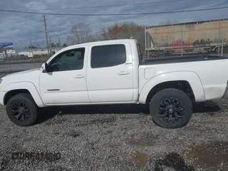 2015 Toyota Tacoma with VIN 3TMLU4EN5FM188601, listed as a IAAI auction lot 41883555 with 143,904 mi miles and . Bid and sale history available at DreamBid. Image 15.