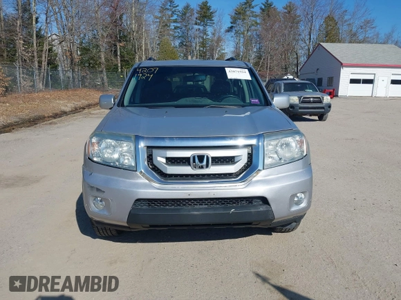 2011 Honda Pilot Touring with VIN 5FNYF4H96BB012122, listed as a IAAI auction lot 42071924 with 211,000 mi miles. Bid and sale history available at carsss.com. Image 12.