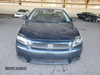 2005 Scion tC with VIN JTKDE177950027533, listed as a Copart auction lot 77613954 with 179,691 mi miles and Salvage Title. Bid and sale history available at carsss.com. Image 5.