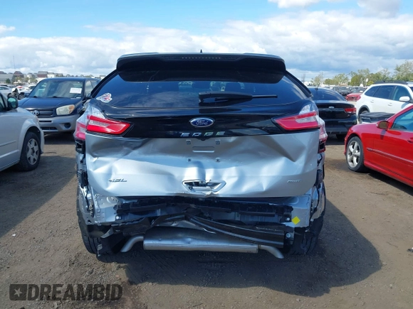 2024 Ford Edge SEL z VIN 2FMPK4J9XRBA43703, wystawiony jako IAAI lot #42064393 z przebiegiem 15 522 mil mil oraz . Historia ofert i sprzedaży dostępna na DreamBid. Obrazek 6.