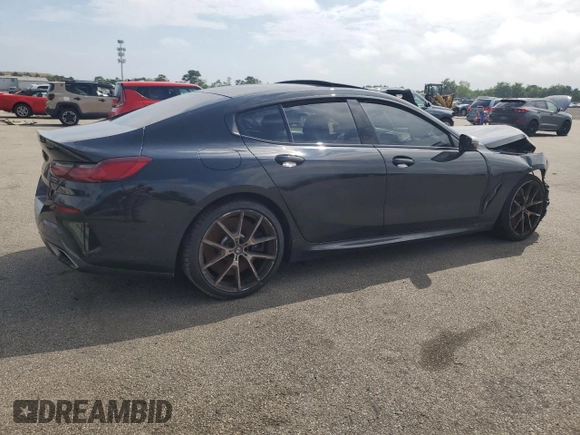 2020 BMW 8 Series M850i with VIN WBAGV8C07LBP48826, listed as a Copart auction lot 65445504 with 32,147 mi miles and Salvage title. Bid and sale history available at DreamBid. Image 3.