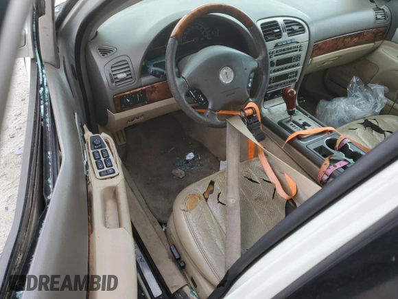 2005 Lincoln LS Sport z VIN 1LNHM87A65Y659418, wystawiony jako Copart lot #86701384 z przebiegiem Nie podano mil oraz Szkoda całkowita • Salvage title. Historia ofert i sprzedaży dostępna na DreamBid. Obrazek 8.