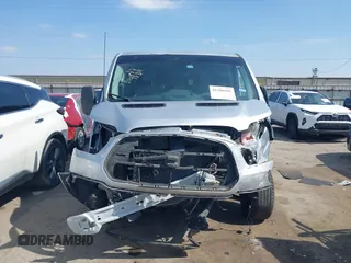 2015 Ford Transit XL with VIN 1FBZX2ZMXFKA31553, listed as a IAAI auction lot 41588965 with 204,796 mi miles and . Bid and sale history available at DreamBid. Image 12.