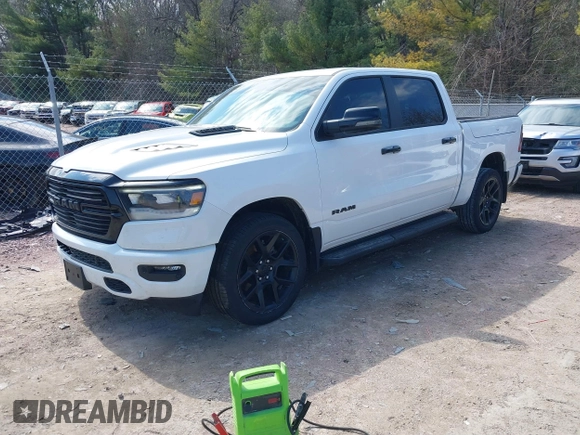 2023 Ram 1500 Laramie with VIN 1C6SRFJT8PN520610, listed as a IAAI auction lot 41898526 with 23,605 mi miles and . Bid and sale history available at DreamBid. Image 2.