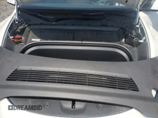 2024 Tesla Model Y Long Range z VIN 7SAYGAEE8RF211702, wystawiony jako Copart lot #58569035 z przebiegiem 8 797 mil mil oraz Szkoda całkowita • Salvage title. Historia ofert i sprzedaży dostępna na DreamBid. Obrazek 11.