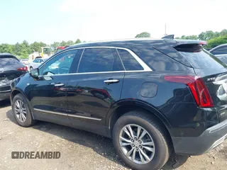 2022 Cadillac XT5 AWD Premium Luxury with VIN 1GYKNDRS9NZ153897, listed as a IAAI auction lot 39837633 with 81,342 mi miles and . Bid and sale history available at DreamBid. Image 14.