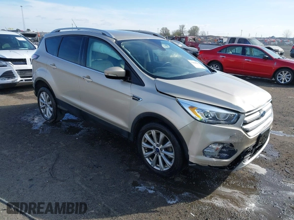 2017 Ford Escape Titanium with VIN 1FMCU0JD3HUB19602, listed as a IAAI auction lot 41816296 with 70,311 mi miles. Bid and sale history available at carsss.com. Image 1.