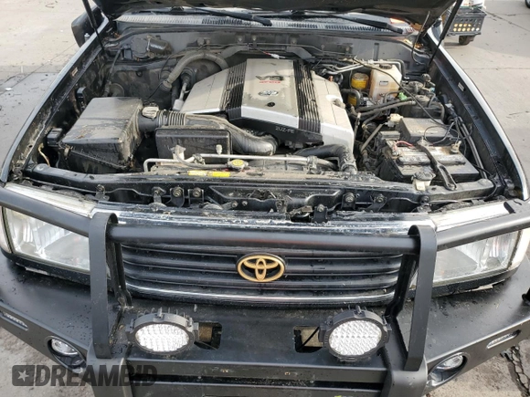1999 Toyota Land Cruiser with VIN JT3HT05J4X0060695, listed as a Copart auction lot 75541434 with 282,651 mi miles and Salvage Title. Bid and sale history available at carsss.com. Image 12.