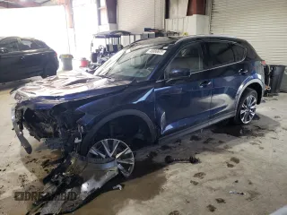 2021 Mazda CX-5 Grand Touring with VIN JM3KFBDM3M0327635, listed as a Copart auction lot 49980635 with 47,160 mi miles and Salvage Title. Bid and sale history available at carsss.com. Image 1.