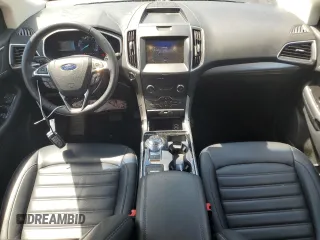 2020 Ford Edge SEL с VIN 2FMPK4J96LBA06946, выставлен на аукционе Copart как лот 56898855 с пробегом 54 984 миль миль и Списание • Salvage title. История ставок и продаж доступна на DreamBid. Изображение 8.