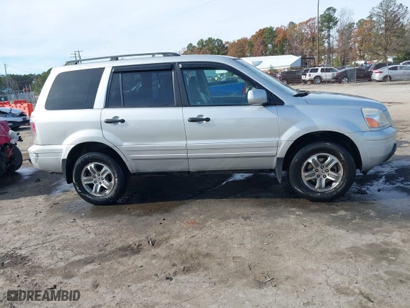 2004 Honda Pilot EX with VIN 2HKYF18634H515163, listed as a IAAI auction lot 40786017 with 206,036 mi miles. Bid and sale history available at carsss.com. Image 13.
