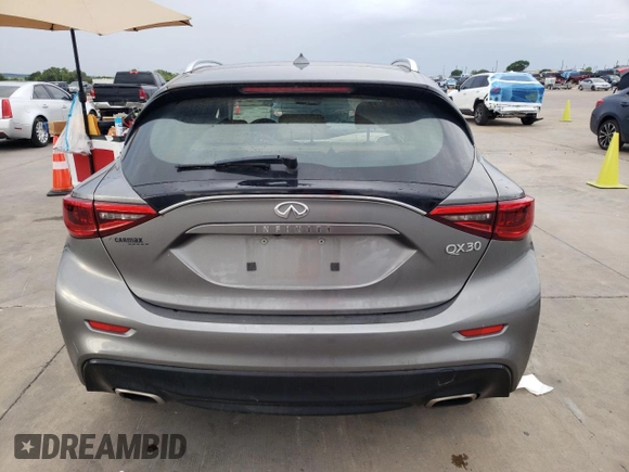 2019 Infiniti QX30 Luxe with VIN SJKCH5CP8KA009597, listed as a Copart auction lot 54388245 with 73,944 mi miles and Salvage title. Bid and sale history available at DreamBid. Image 6.