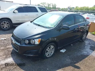 2014 Chevrolet Sonic LT with VIN 1G1JC5SH8E4168554, listed as a IAAI auction lot 42129823 with 276,709 mi miles and . Bid and sale history available at DreamBid. Image 2.