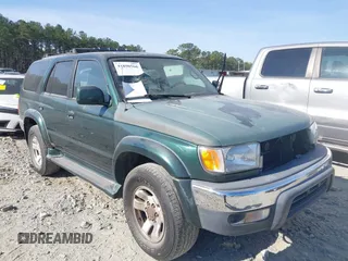 2000 Toyota 4Runner SR5 z VIN JT3HN86R6Y0305155, wystawiony jako IAAI lot #41890566 z przebiegiem 223 502 mil mil oraz . Historia ofert i sprzedaży dostępna na DreamBid. Obrazek 1.