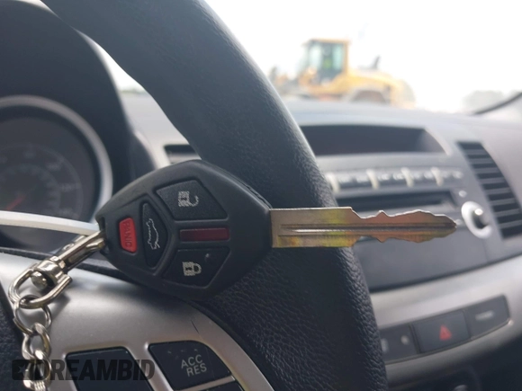 2012 Mitsubishi Lancer SE z VIN JA32V2FW0CU012937, wystawiony jako IAAI lot #42602100 z przebiegiem 143 946 mil mil oraz . Historia ofert i sprzedaży dostępna na DreamBid. Obrazek 11.