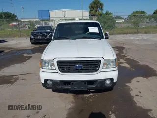 2009 Ford Ranger XLT with VIN 1FTYR44E89PA51577, listed as a IAAI auction lot 42000010 with 139,642 mi miles. Bid and sale history available at carsss.com. Image 12.