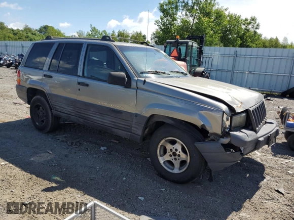 1998 Jeep Grand Cherokee Laredo z VIN 1J4GZ58S4WC278490, wystawiony jako Copart lot #62388535 z przebiegiem 133 896 mil mil oraz Czysty tytuł • Clean title. Historia ofert i sprzedaży dostępna na DreamBid. Obrazek 4.