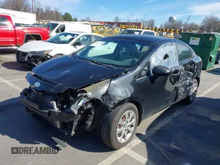 2013 Kia Rio SX with VIN KNADN4A32D6211574, listed as a IAAI auction lot 41671851 with 224,203 mi miles. Bid and sale history available at carsss.com. Image 2.