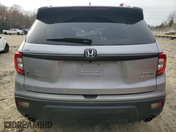 2020 Honda Passport Touring with VIN 5FNYF8H96LB004076, listed as a Copart auction lot 81239214 with 55,787 mi miles and Salvage title. Bid and sale history available at DreamBid. Image 6.