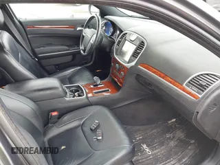 2013 Chrysler 300 with VIN 2C3CCAAG9DH707447, listed as a IAAI auction lot 42292077 with 171,329 mi miles and . Bid and sale history available at DreamBid. Image 5.