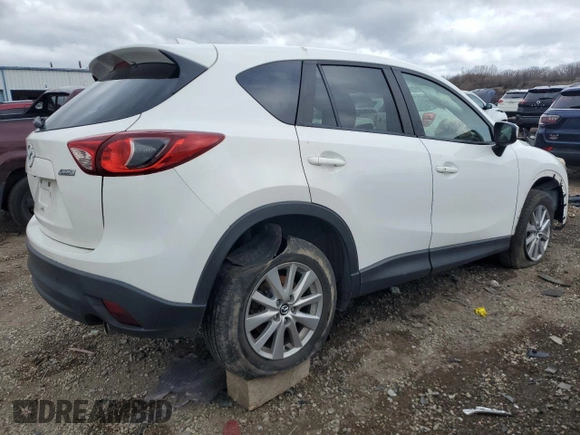 2015 Mazda CX-5 Touring with VIN JM3KE2CY2F0541400, listed as a Copart auction lot 52971015 with 131,569 mi miles and Clean Title. Bid and sale history available at carsss.com. Image 3.
