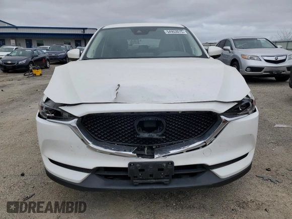 2020 Mazda CX-5 Touring z VIN JM3KFBCM8L1789067, wystawiony jako Copart lot #54953015 z przebiegiem 134 306 mil mil oraz Nie do naprawy • Non repairable. Historia ofert i sprzedaży dostępna na DreamBid. Obrazek 5.