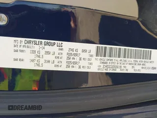2014 Dodge Grand Caravan SXT with VIN 2C4RDGCG3ER266199, listed as a IAAI auction lot 42119064 with 148,067 mi miles and . Bid and sale history available at DreamBid. Image 9.
