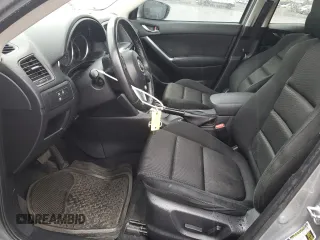 2015 Mazda CX-5 Touring with VIN JM3KE2CY4F0469096, listed as a Copart auction lot 48075105 with 131,788 mi miles and Salvage Title. Bid and sale history available at carsss.com. Image 7.