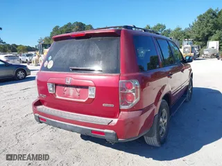 2006 Honda Pilot EX-L with VIN 5FNYF18566B022909, listed as a IAAI auction lot 40576412 with 310,278 mi miles. Bid and sale history available at carsss.com. Image 4.