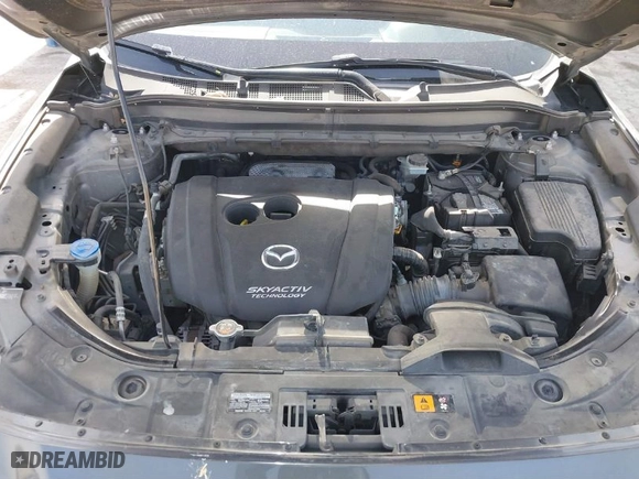 2019 Mazda CX-5 Touring with VIN JM3KFACMXK0686957, listed as a IAAI auction lot 41720338 with 95,421 mi miles. Bid and sale history available at carsss.com. Image 10.
