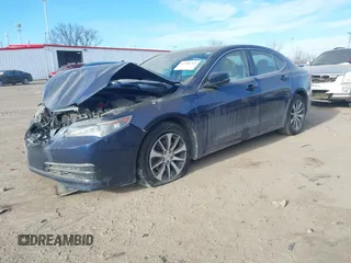 2015 Acura TLX with VIN 19UUB1F34FA026866, listed as a IAAI auction lot 41386202 with 72,638 mi miles. Bid and sale history available at carsss.com. Image 2.