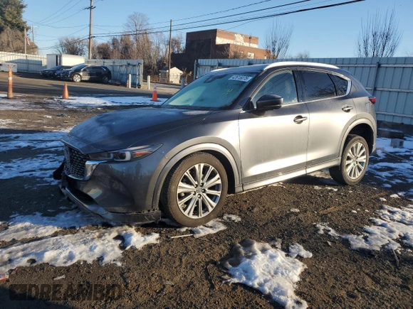 2023 Mazda CX-5 Signature with VIN JM3KFBXY8P0258573, listed as a Copart auction lot 42615075 with 18,916 mi miles and Salvage Title. Bid and sale history available at carsss.com. Image 1.