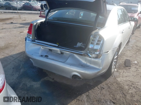 2012 Chrysler 300 with VIN 2C3CCAAG6CH104745, listed as a IAAI auction lot 40708856 with 125,186 mi miles. Bid and sale history available at carsss.com. Image 6.