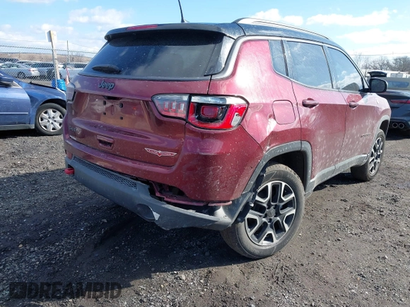 2020 Jeep Compass Trailhawk with VIN 3C4NJDDB2LT239384, listed as a IAAI auction lot 41527372 with 56,122 mi miles and . Bid and sale history available at carsss.com. Image 6.