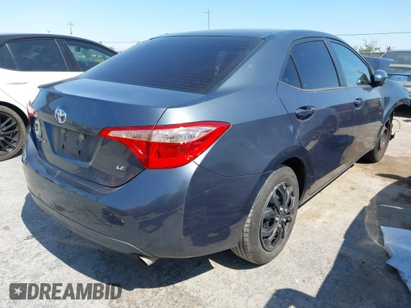2018 Toyota Corolla L with VIN 5YFBURHE2JP826065, listed as a IAAI auction lot 42587503 with 172,350 mi miles and . Bid and sale history available at DreamBid. Image 4.