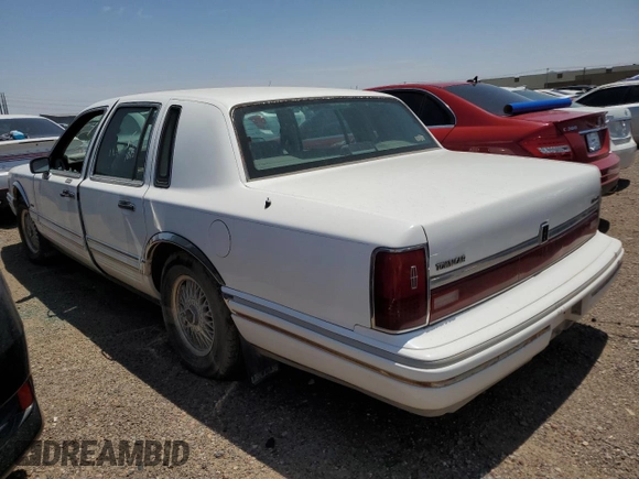 1994 Lincoln Town Car Signature z VIN 1LNLM82W3RY633555, wystawiony jako Copart lot #81430533 z przebiegiem 202 350 mil mil oraz Czysty tytuł • Clean title. Historia ofert i sprzedaży dostępna na DreamBid. Obrazek 2.
