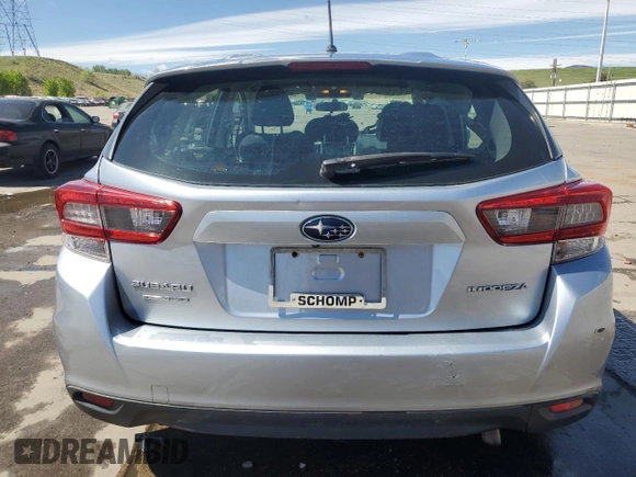 2020 Subaru Impreza with VIN 4S3GTAB68L3711610, listed as a Copart auction lot 57270725 with 48,644 mi miles and Salvage title. Bid and sale history available at DreamBid. Image 6.