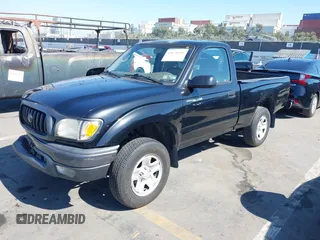 2003 Toyota Tacoma with VIN 5TENL42N33Z180883, listed as a IAAI auction lot 41676416 with 132,996 mi miles and . Bid and sale history available at DreamBid. Image 2.