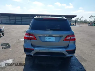 2013 Mercedes-Benz M ML 63 AMG with VIN 4JGDA7EB9DA155725, listed as a IAAI auction lot 41502675 with 64,849 mi miles. Bid and sale history available at carsss.com. Image 15.
