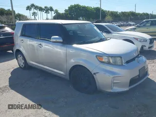 2013 Scion xB with VIN JTLZE4FE9DJ031271, listed as a IAAI auction lot 41748699 with 66,796 mi miles. Bid and sale history available at carsss.com. Image 1.