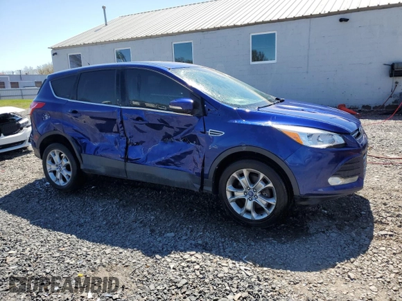2013 Ford Escape SEL with VIN 1FMCU9HX7DUA78826, listed as a Copart auction lot 53275325 with 128,650 mi miles and Salvage title. Bid and sale history available at DreamBid. Image 4.
