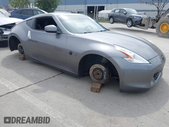 2012 Nissan 370Z Touring with VIN JN1AZ4EH4CM561415, listed as a IAAI auction lot 41838948 with 111,298 mi miles. Bid and sale history available at carsss.com. Image 1.