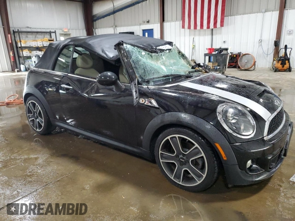 2013 MINI Convertible S with VIN WMWZP3C51DT297891, listed as a Copart auction lot 56745065 with 101,292 mi miles and Salvage title. Bid and sale history available at DreamBid. Image 4.