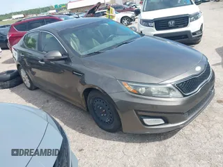 2014 Kia Optima EX z VIN 5XXGN4A73EG300947, wystawiony jako IAAI lot #42184646 z przebiegiem 215 317 mil mil oraz . Historia ofert i sprzedaży dostępna na DreamBid. Obrazek 1.