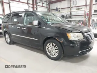 2013 Chrysler Town & Country Limited with VIN 2C4RC1GG0DR509167, listed as a IAAI auction lot 41973819 with 186,896 mi miles. Bid and sale history available at carsss.com. Image 1.